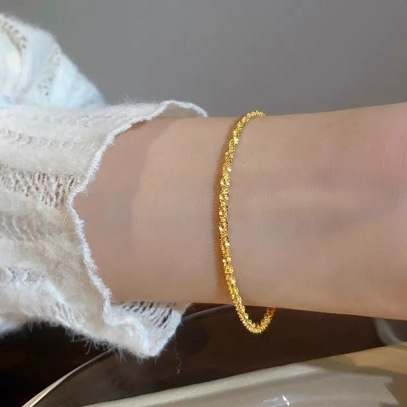 Golden sparkling women's bracelet