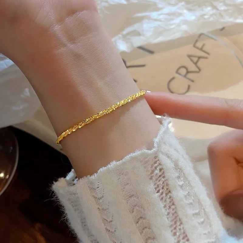 Golden sparkling women's bracelet